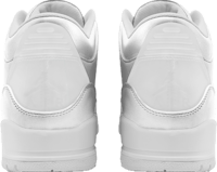 a pair of white sneakers on a white background
