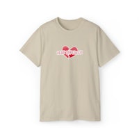 a beige t - shirt with a heart on it