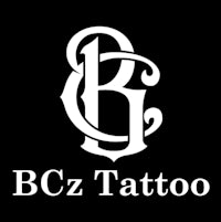 bcz tattoo logo on a black background