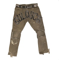 a pair of jeans with the word gulsch on them