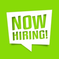 now hiring sign on a green background