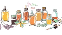 various bottles of essential oils on a white background