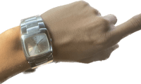 a woman's wrist with a silver watch on it