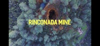 the words rincona mine are shown in the middle of a forest