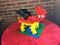 a dragon made out of legos on a table