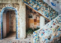a house with a staircase made of mosaic tiles