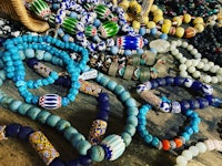 a group of colorful beads on a table