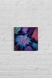 a blue and purple abstract painting on a brick wall