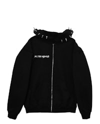 a black hoodie with spikes on it