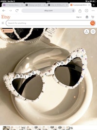 a picture of a pair of sunglasses on a plate