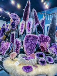 amethyst crystals on display in a store