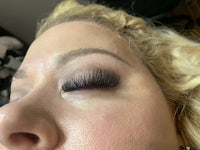 a woman with lashes on her face