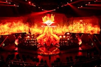 an image of a stage with a fire on it