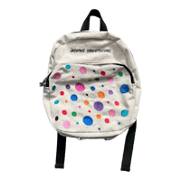 a backpack with colorful dots on it