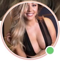 a woman is posing for a photo with a sexy cleavage