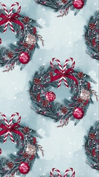 a christmas wreath pattern on a blue background