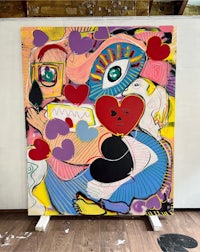 a large painting with a heart on it