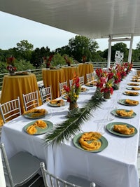 a table is set up on a deck