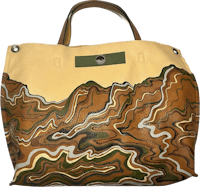 a handbag with a brown and green design on it