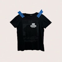 a black t - shirt with a blue ribbon on it
