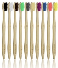 five different colored toothbrushes are lined up on a white background