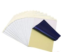 a stack of yellow and blue sheets of paper