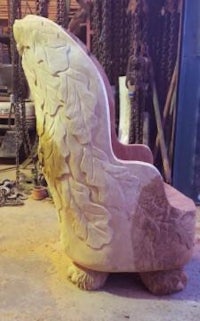 a chair that has been carved out of stone
