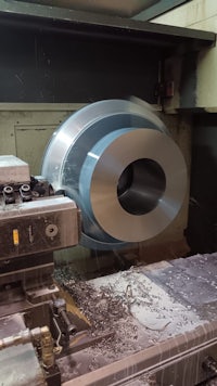 cnc machining of a metal part in a machine shop