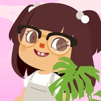 a girl with glasses and a plant in front of her