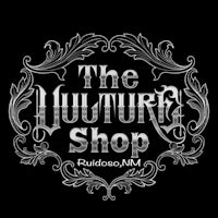 the vulture shop logo on a black background