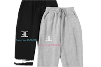 a pair of sweatpants with the word e on them