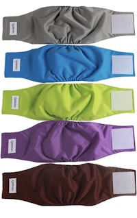 a set of diaper covers in different colors