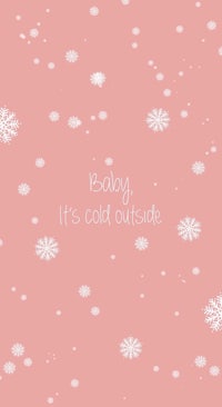 a pink background with snowflakes and the words baby it's cold outside
