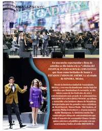 a magazine with a picture of a man and a woman performing in front of an orchestra