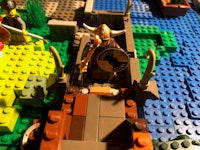 a lego set with vikings and a boat on it