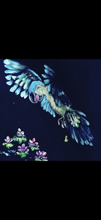 a painting of a parrot flying over a flower