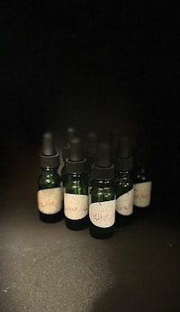 a group of small bottles with labels on them