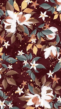 a floral pattern in maroon and gold
