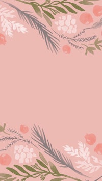 a pink background with flowers and leaves