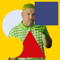a man holding up a yellow and green square