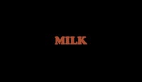 a black background with the word milk on it