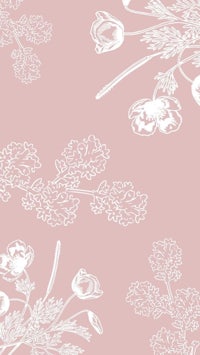 a white floral pattern on a pink background