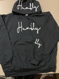 a black hoodie with the word humble written on it