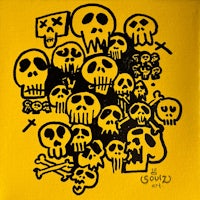 a drawing of skulls on a yellow background