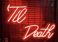 a neon sign that says til death