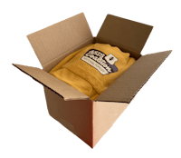 a yellow t - shirt in a cardboard box