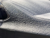 a car covered in snow