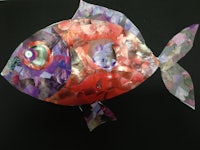 a fish made out of colorful paper