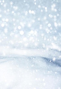 a snowy background with snowflakes on it