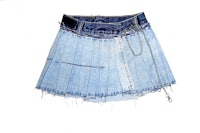 a blue denim skirt with chains hanging on it